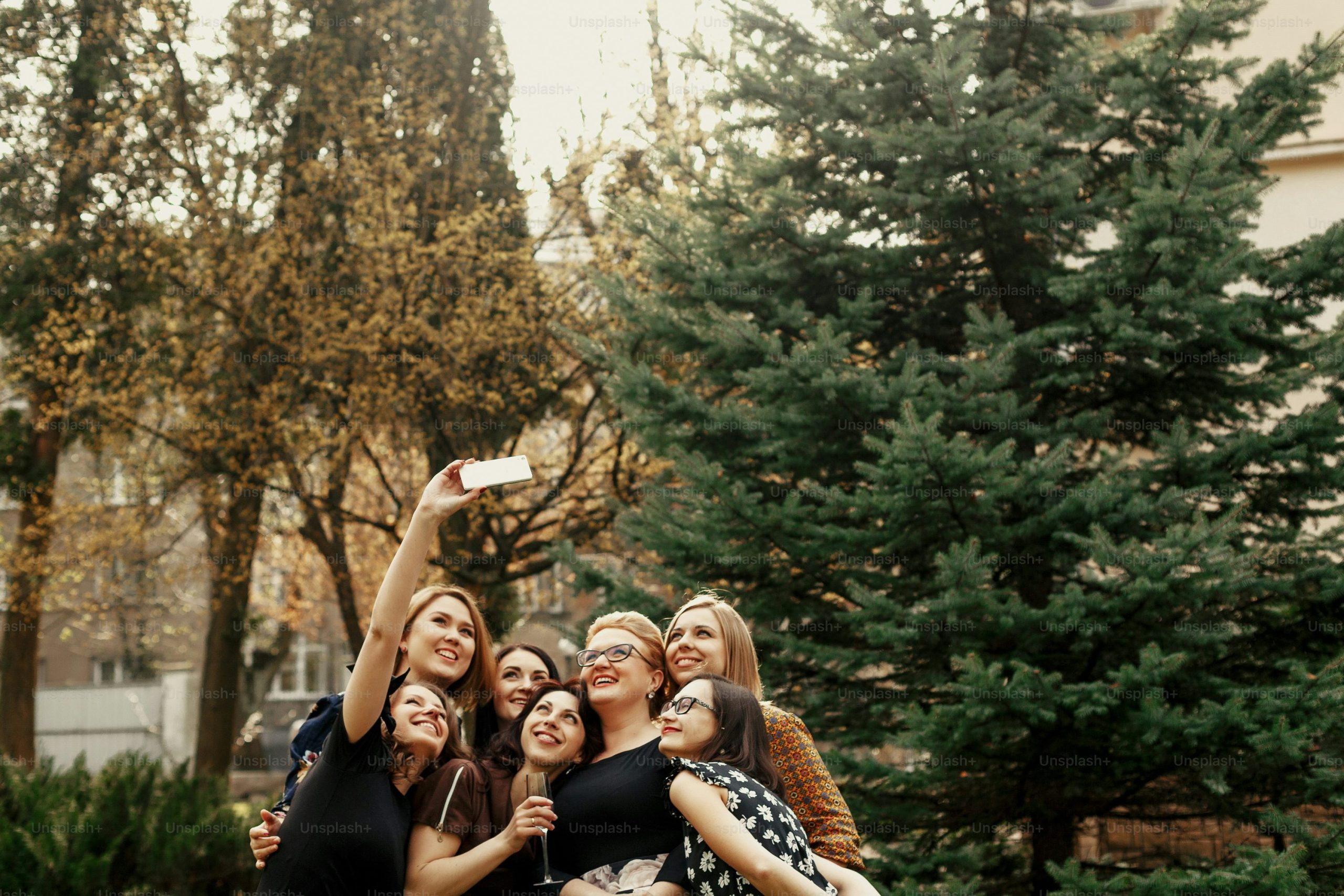 stylish elegant women taking funny selfie at celebration sunny in park, luxury happy life concept